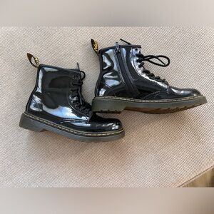 Dr. Martens Black Patent Leather Ankle Boots with Yellow Heel Loop